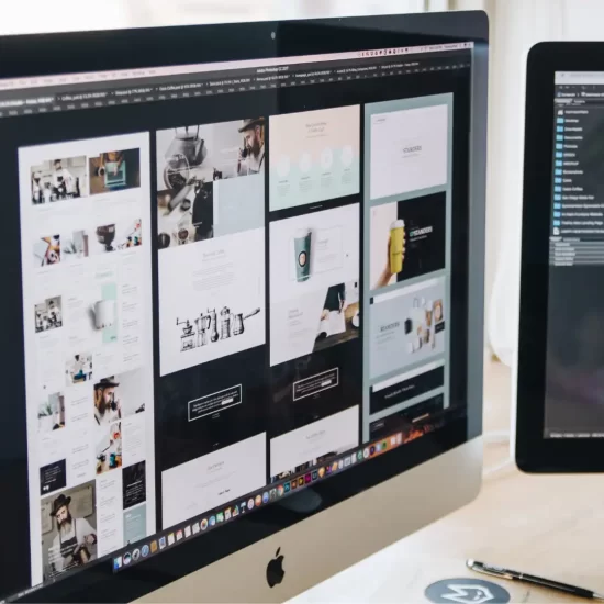 Best web design agency Manchester – team reviewing a website design project in a modern UK office