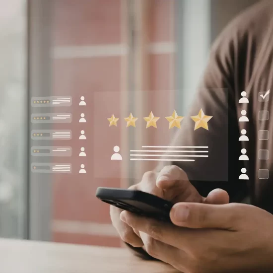 How to get more Google reviews — business owner viewing five-star Google review ratings on laptop screen