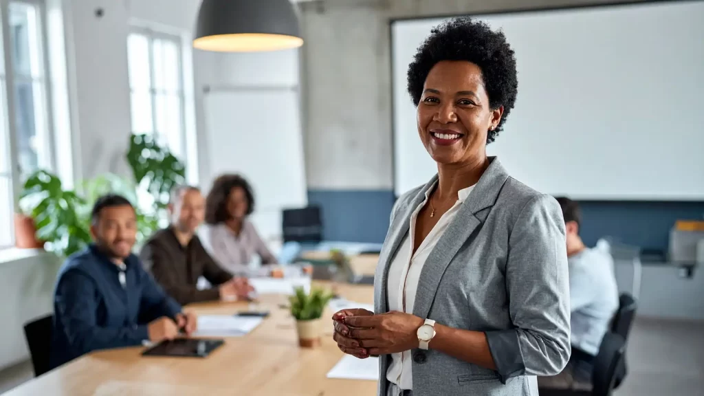 Website design Manchester agency discussing post-launch support and maintenance with a local business client